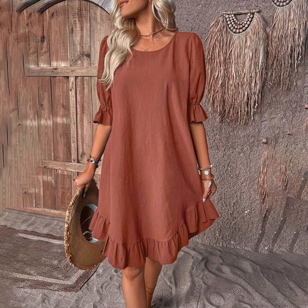 Mia | Elegante jurk met pofmouwen in de kleur Bruin voor dames in stijl ideaal voor de lente.