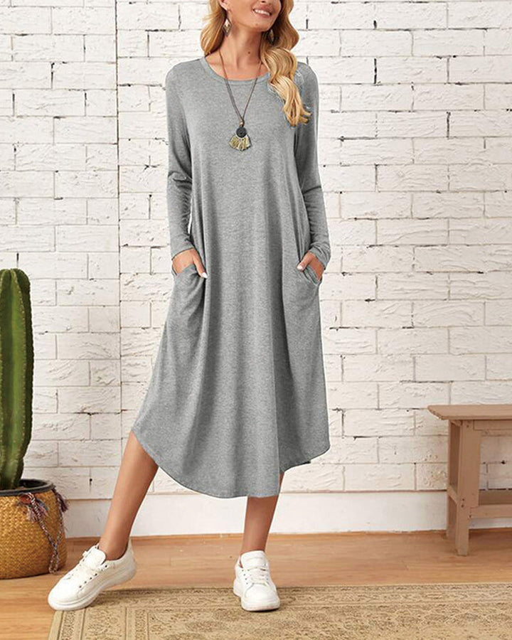 Milleke | Damesjurk met lange mouwen in de kleur Grijs voor dames in stijl ideaal voor de lente.