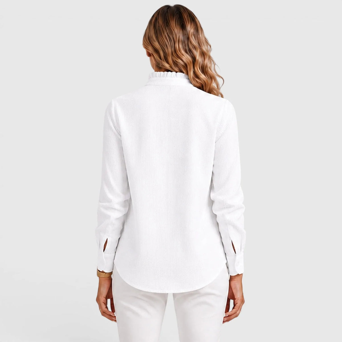 Blouse met ruffles en knopen
