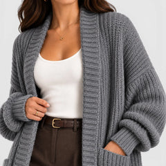 Oversized gebreide jas met zakken