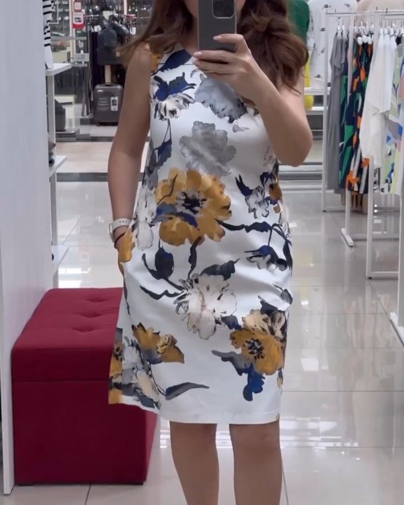 Mouwloze elegante jurk met bloemenprint in de kleur Wit voor dames in stijl ideaal voor de zomer.
