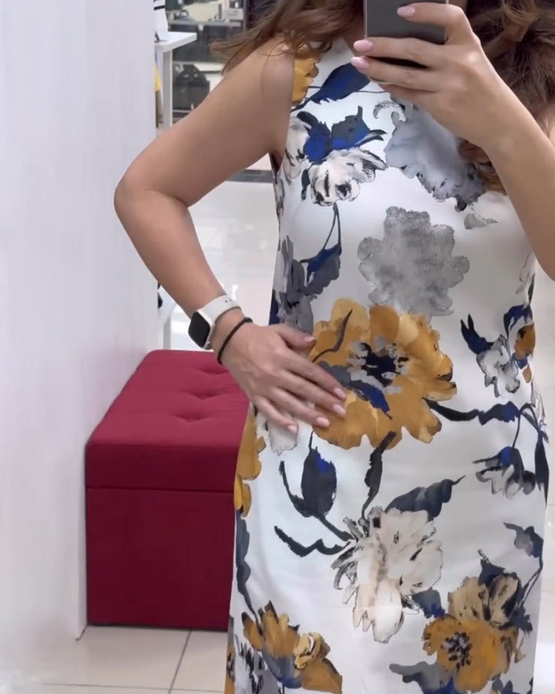 Mouwloze elegante jurk met bloemenprint in de kleur Wit voor dames in stijl ideaal voor de zomer.