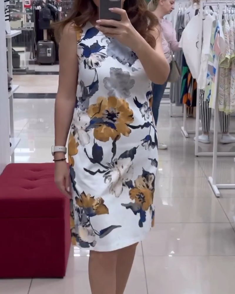 Mouwloze elegante jurk met bloemenprint in de kleur Wit voor dames in stijl ideaal voor de zomer.