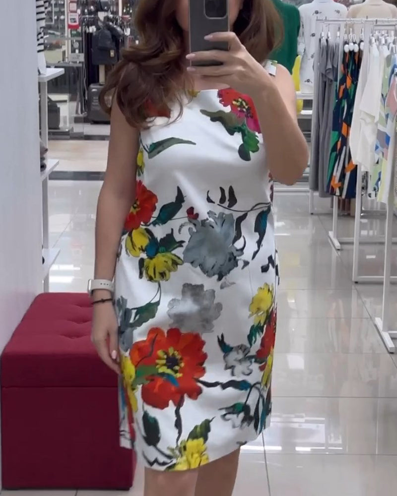 Mouwloze elegante jurk met bloemenprint in de kleur Wit voor dames in stijl ideaal voor de zomer.