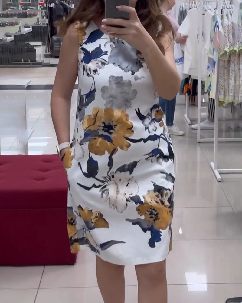 Mouwloze elegante jurk met bloemenprint in de kleur Wit voor dames in stijl ideaal voor de zomer.