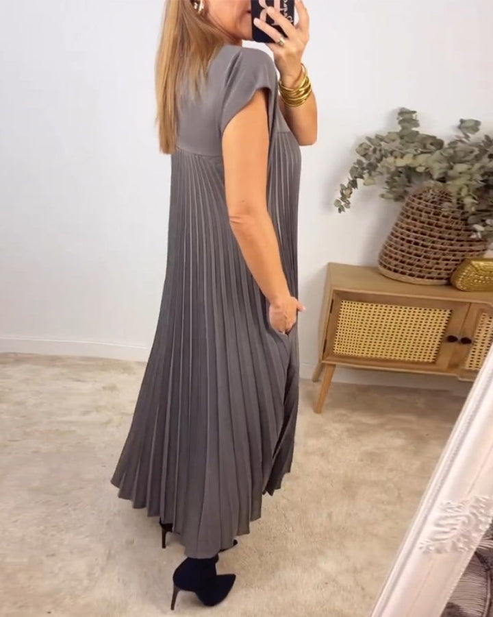 Mouwloze geplooide eenvoudige effen kleur jurk in de kleur Beige voor dames in stijl ideaal voor de herfst.