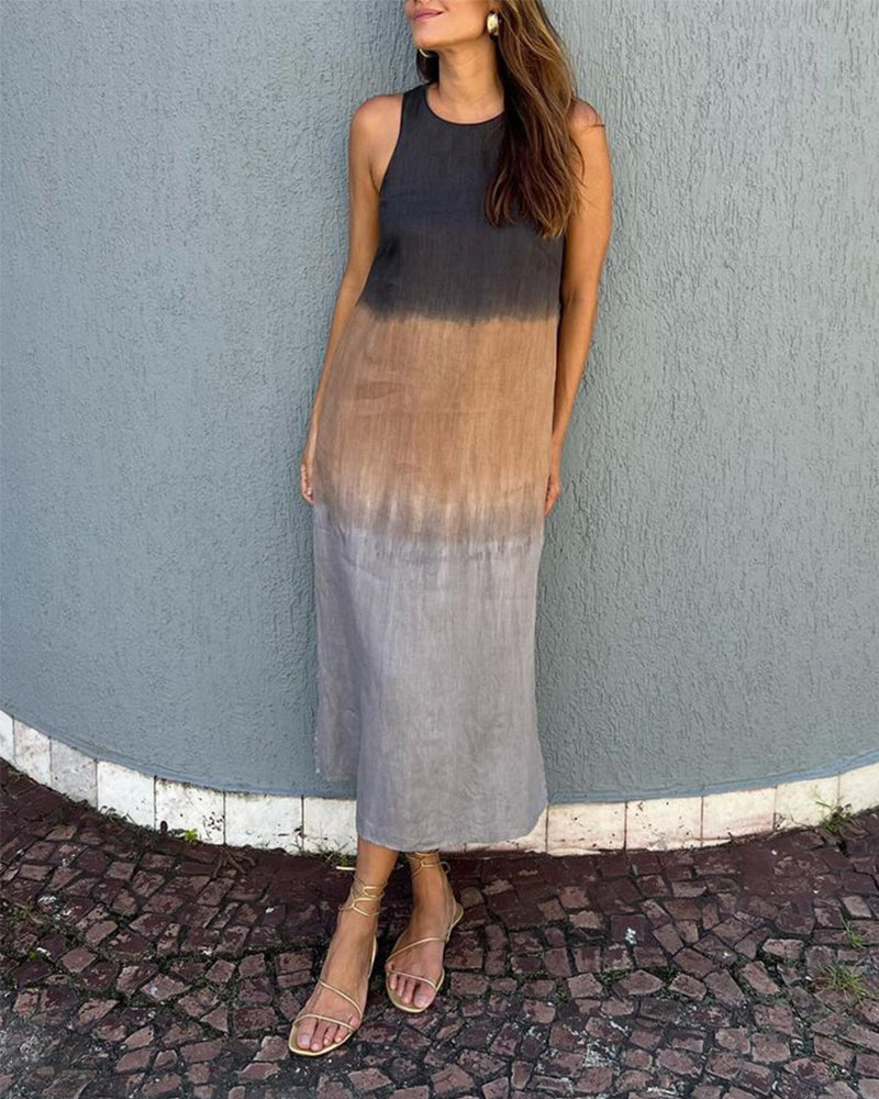 Mouwloze jurk met zijsplit in de kleur Grijs voor dames in stijl ideaal voor de lente.