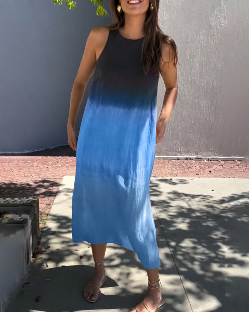 Mouwloze jurk met zijsplit in de kleur Grijs voor dames in stijl ideaal voor de lente.