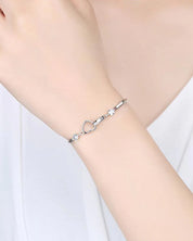 Nina | Armband Soul Sister Hart in de kleur Zilver voor dames in stijl geschikt voor alle seizoenen.