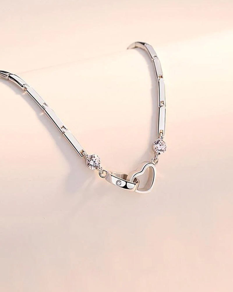 Nina | Armband Soul Sister Hart in de kleur Zilver voor dames in stijl geschikt voor alle seizoenen.