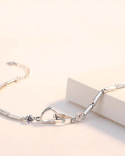 Nina | Armband Soul Sister Hart in de kleur Zilver voor dames in stijl geschikt voor alle seizoenen.
