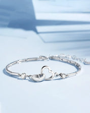 Nina | Armband Soul Sister Hart in de kleur Zilver voor dames in stijl geschikt voor alle seizoenen.
