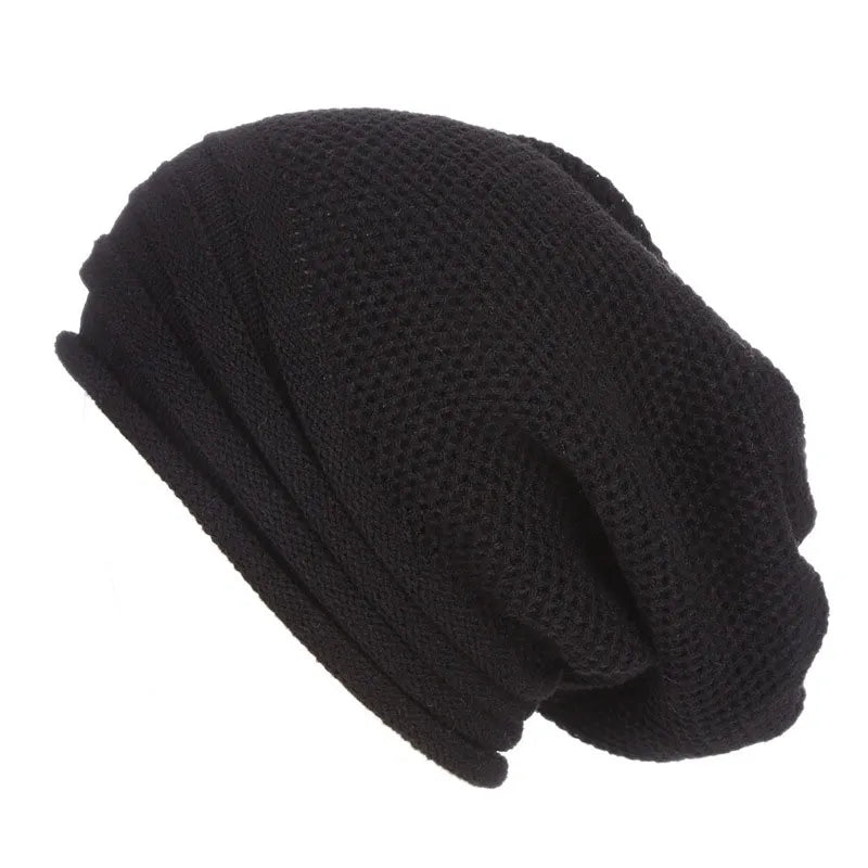 Nina | Comfy & trendy gebreide beanie in de kleur Zwart voor dames in Streetwear stijl ideaal voor de winter