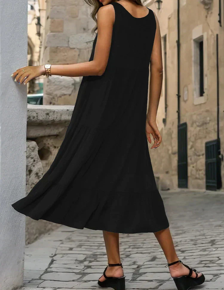 Nina zwarte midi-jurk met knopen in de kleur Zwart voor dames in Formal stijl ideaal voor de zomer.