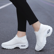 Ondersteunende schoenen met voetboogsteun in de kleur Zwart/Wit voor dames in stijl geschikt voor alle seizoenen.