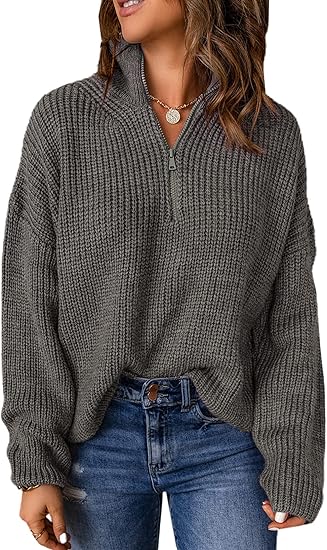 Polo trui met V-hals in de kleur Grijs voor dames in stijl ideaal voor de herfst.