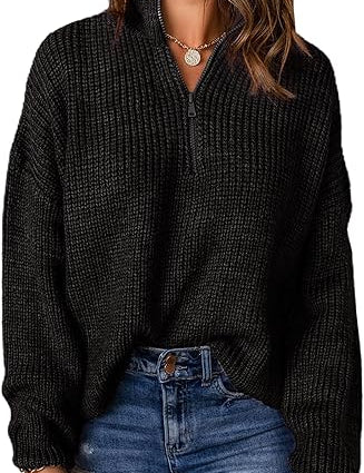 Polo trui met V-hals in de kleur Zwart voor dames in stijl ideaal voor de herfst.