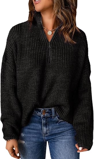 Polo trui met V-hals in de kleur Zwart voor dames in stijl ideaal voor de herfst.