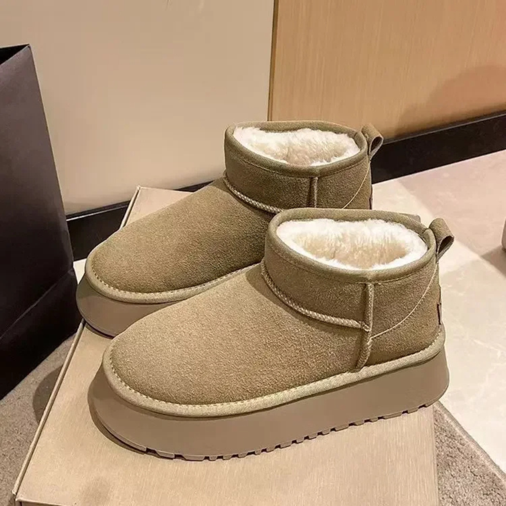Pugg | Pluizige mini ondersteunende laarzen in de kleur 36 voor dames in stijl ideaal voor de herfst.