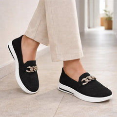 Slip-on sneakers met ketting