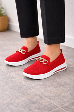 Slip-on sneakers met ketting