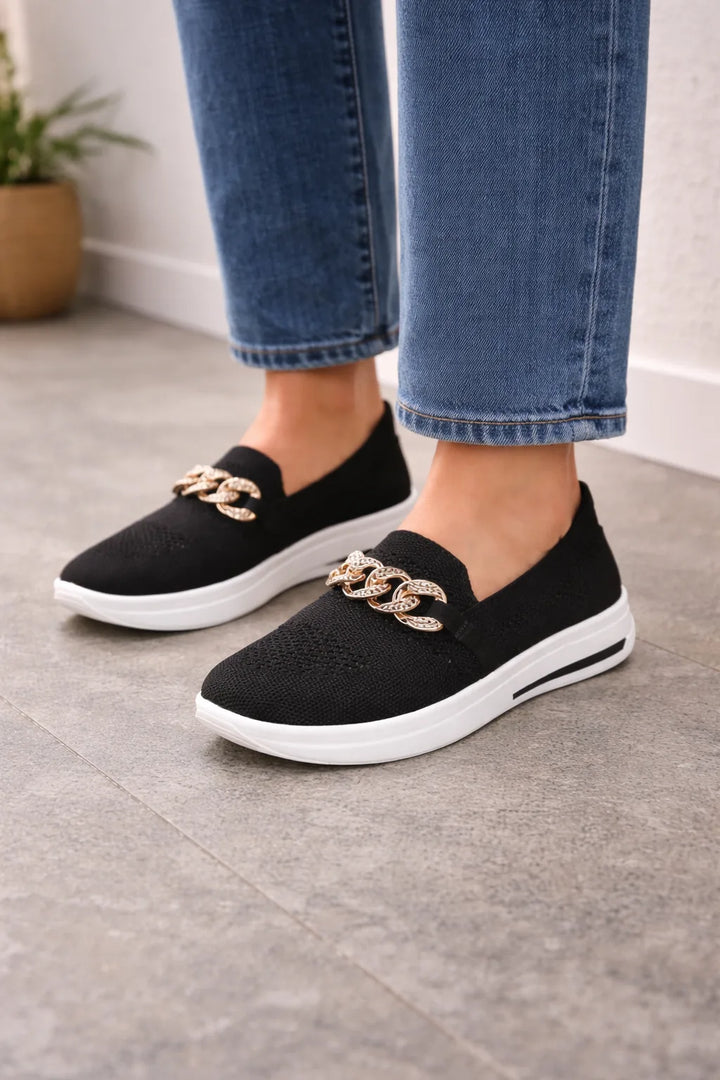 Slip-on sneakers met ketting