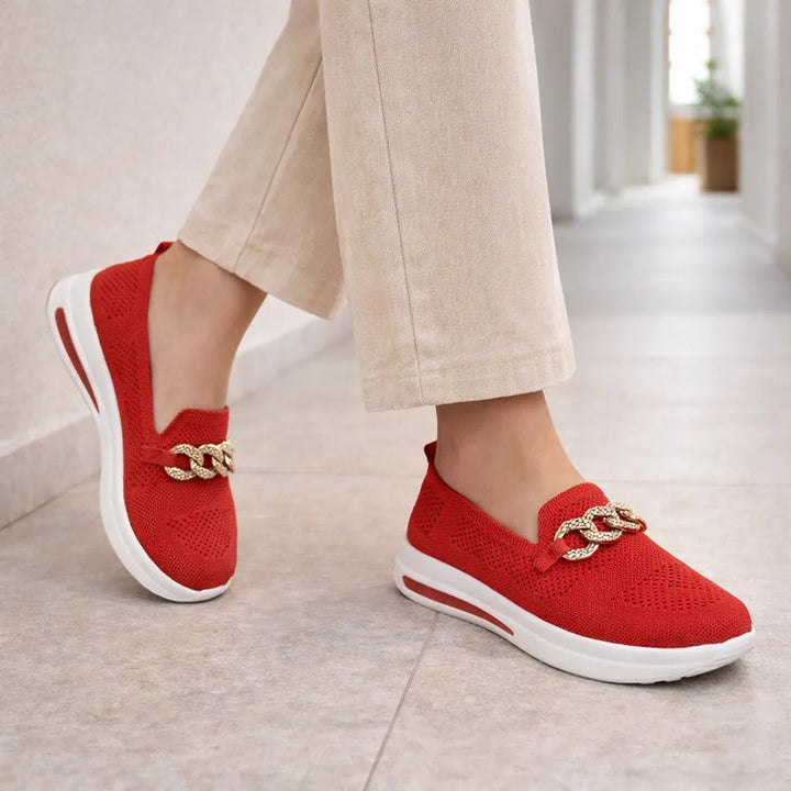 Slip-on sneakers met ketting