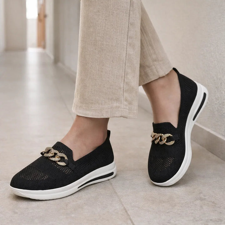 Slip-on sneakers met ketting