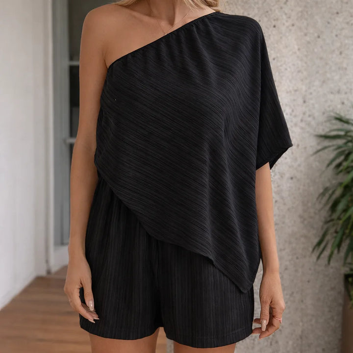 Set met asymmetrische top en wijde shorts