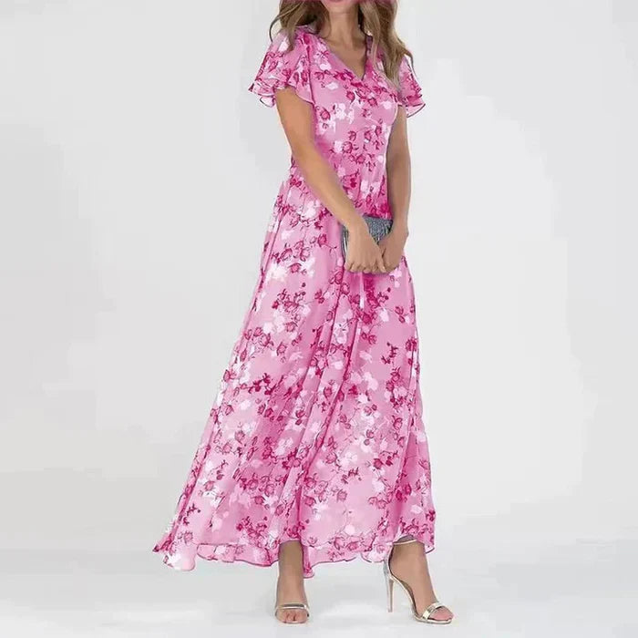 Lange zomerjurk met betoverende bloemenprint voor het ultieme zomergevoel. Deze jurk heeft een flatterende pasvorm en is gemaakt van hoogwaardige materialen voor ultiem comfort en kwaliteit.
