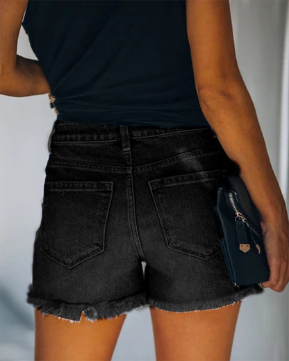 Mid-rise gescheurde denim shorts