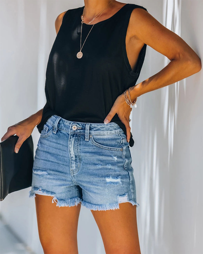 Mid-rise gescheurde denim shorts