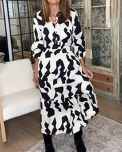 Maxi-jurk met lange mouwen en een print