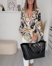 V-hals herfstblouse met kleurtjes