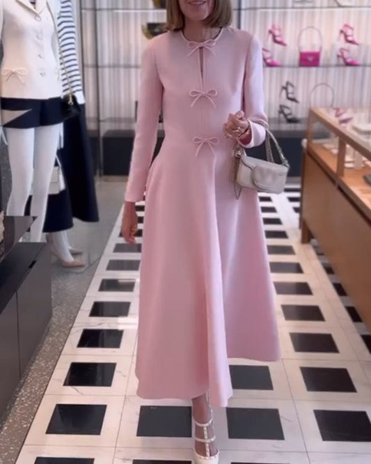 Arial | Effen kleur elegante jurk met strikken in de kleur Roze voor dames in stijl ideaal voor de herfst.