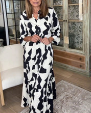Maxi-jurk met lange mouwen en een print