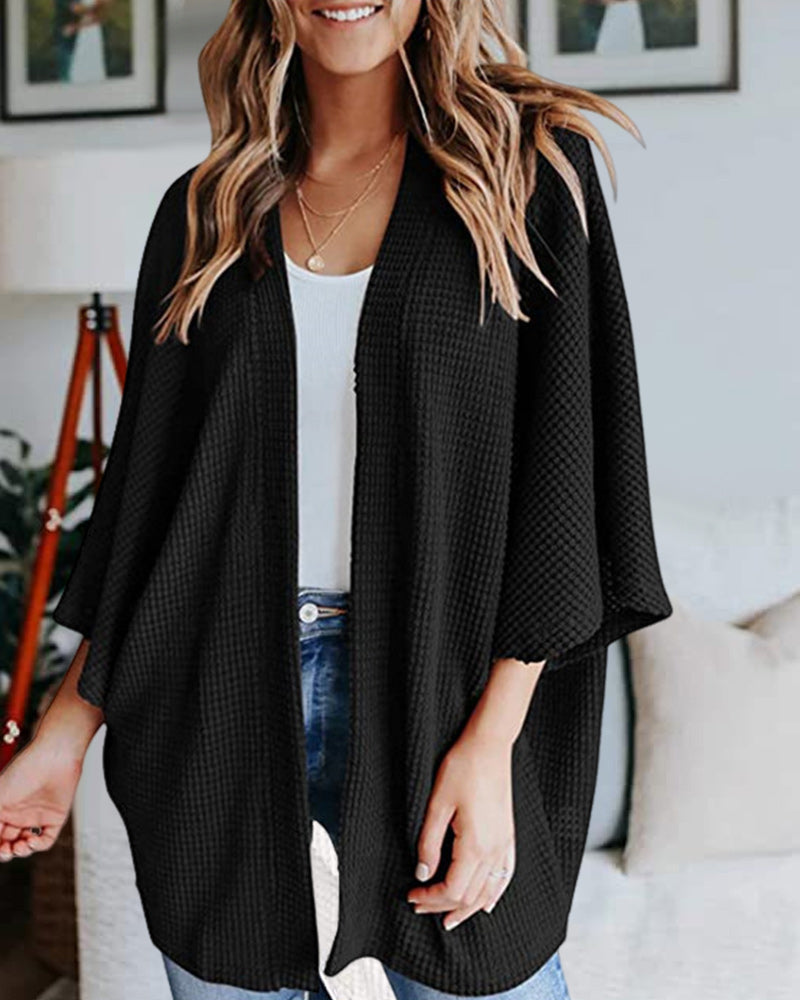 Effen Cardigen met 3/4 mouwen in de kleur Zwart voor dames in stijl ideaal voor de herfst.