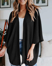 Effen Cardigen met 3/4 mouwen in de kleur Zwart voor dames in stijl ideaal voor de herfst.