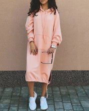Effen kleur jurk met capuchon in de kleur Roze voor dames in stijl ideaal voor de herfst.