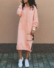 Effen kleur jurk met capuchon in de kleur Roze voor dames in stijl ideaal voor de herfst.