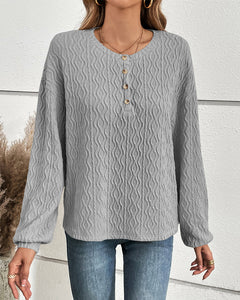 Effen topje met knopen in de kleur Grijs voor dames in stijl ideaal voor de herfst.