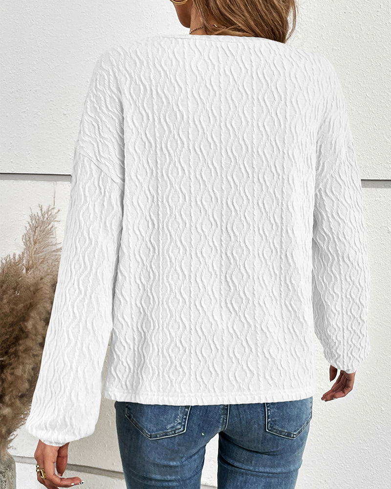 Effen topje met knopen in de kleur Grijs voor dames in stijl ideaal voor de herfst.