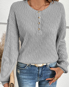 Effen topje met knopen in de kleur Grijs voor dames in stijl ideaal voor de herfst.