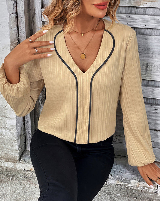 Elegante top met lange mouwen in de kleur Goud voor dames in stijl ideaal voor de herfst.
