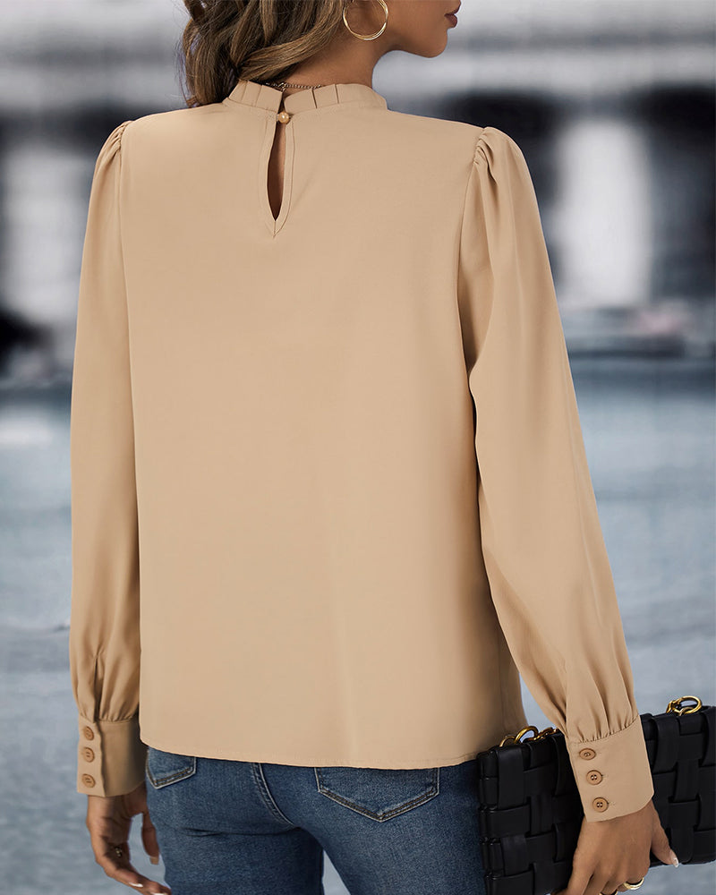 Ellen | Top met staande kraag in de kleur Goud voor dames in stijl ideaal voor de herfst.