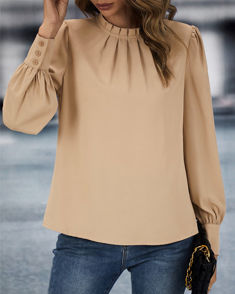 Ellen | Top met staande kraag in de kleur Goud voor dames in stijl ideaal voor de herfst.