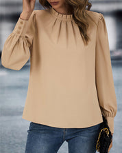 Ellen | Top met staande kraag in de kleur Goud voor dames in stijl ideaal voor de herfst.
