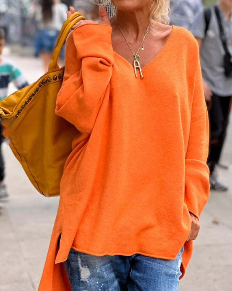 Losse dames tanktop met V-hals in de kleur Oranje voor dames in stijl ideaal voor de herfst.