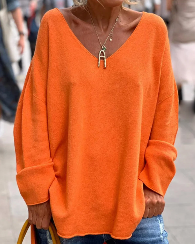 Losse dames tanktop met V-hals in de kleur Oranje voor dames in stijl ideaal voor de herfst.