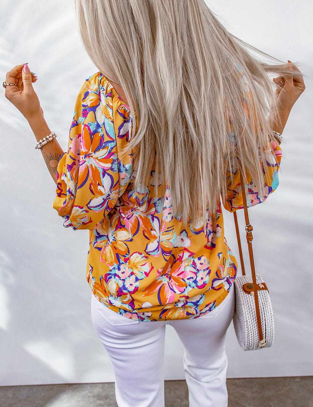 Oranje Bloemenprint Blouse met Elastische Halslijn in de kleur Oranje voor dames in stijl ideaal voor de lente.